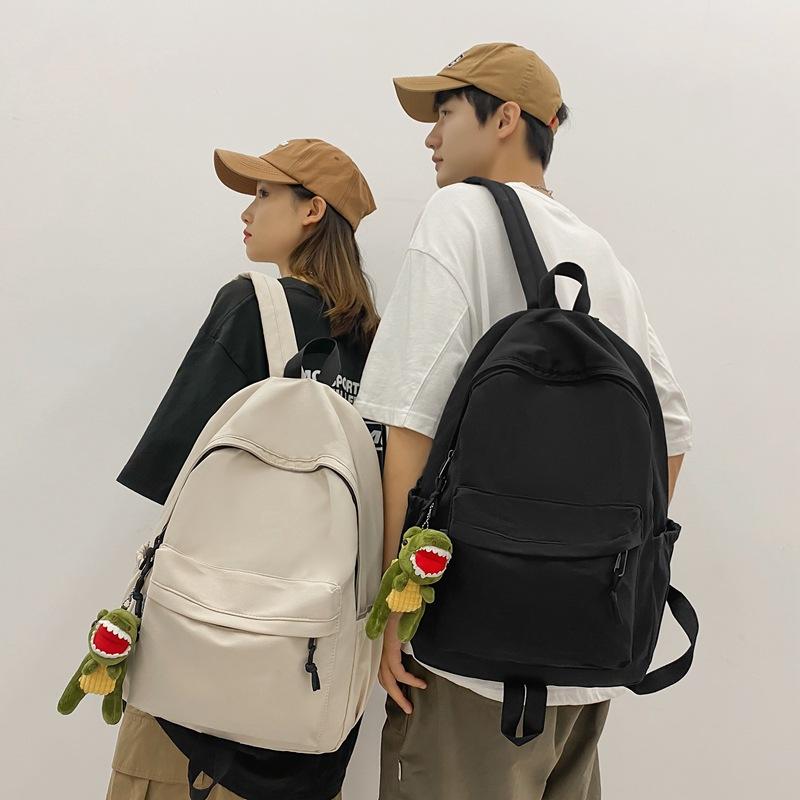 School bag college students solid color simple junior high school students Korean version daily large-capacity street backpack