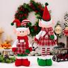 Charming Christmas Stretchable Elf Figurine In Vibrant Red And Colors Green