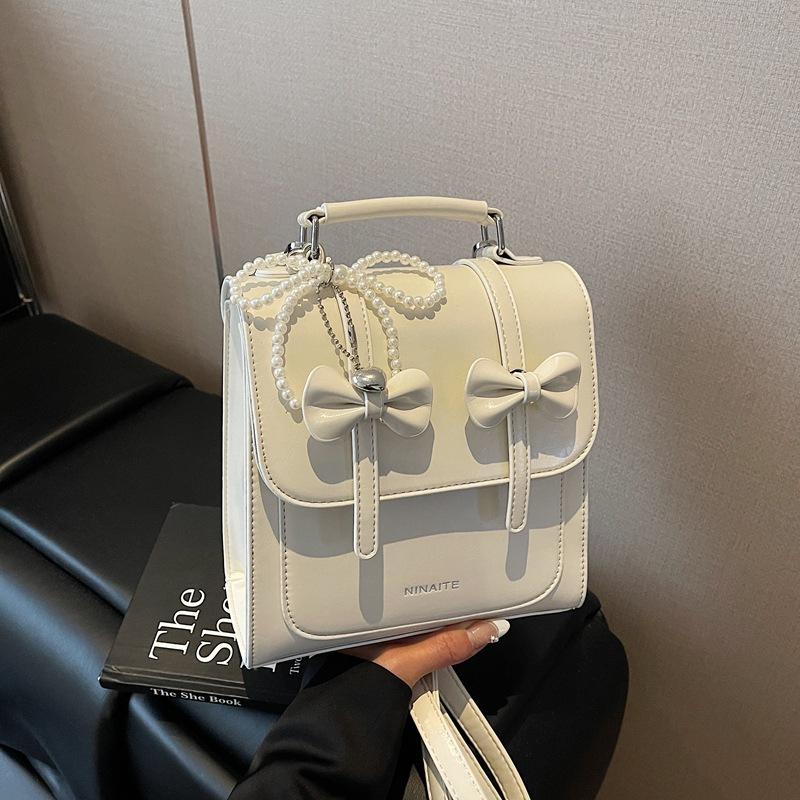 

Нишевая дизайнерская сумка 2025 новая ретро повседневный рюкзак модный повседневный студенческий маленький рюкзак женская сумка