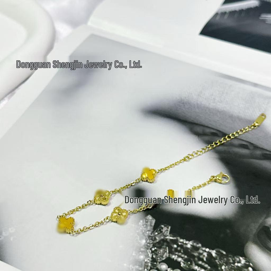 Exquisites goldenes Mini-Armband mit vierblättrigem Kleeblatt für Damen - Trendiger Laserschnittschmuck 18K Intracranial Vacuum gray