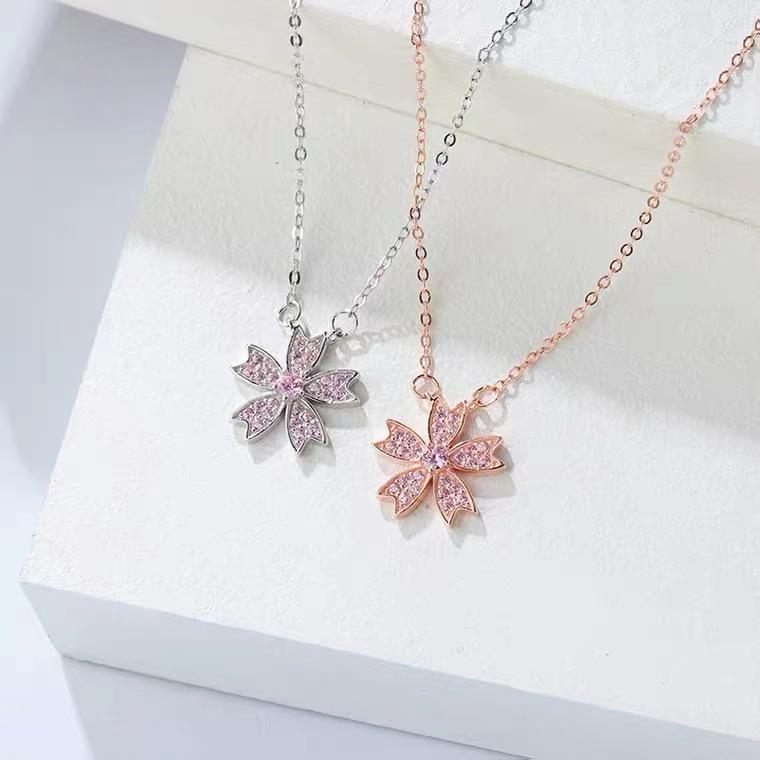 Sakura Flower Pendant Necklace: Women's Sweet Retro Zircon Clavicle Chain - Elegant & Stylish.