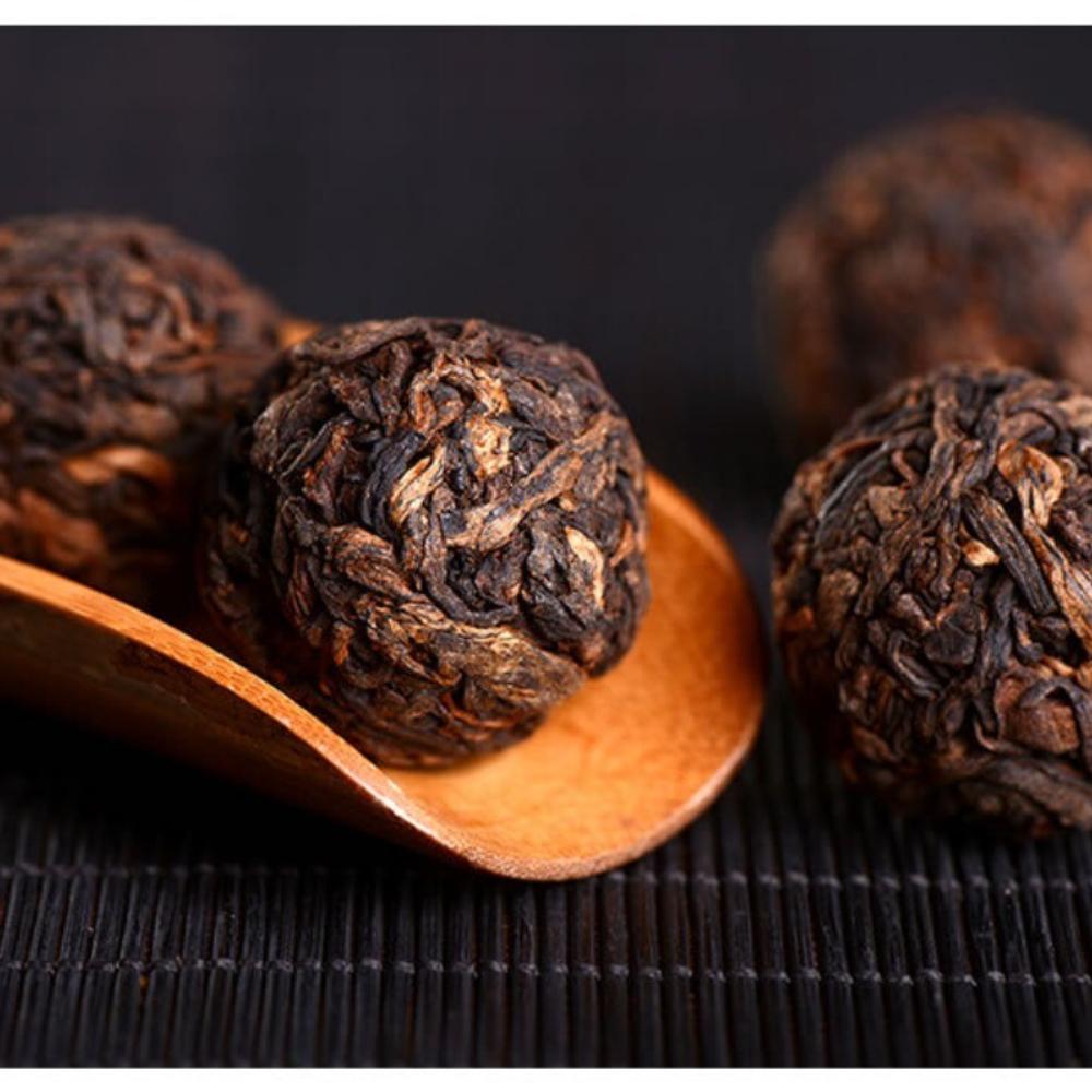 Yunnan Drakenparel Rijpe Pu-erh Thee Premium Mini Tuo Ballen 500g