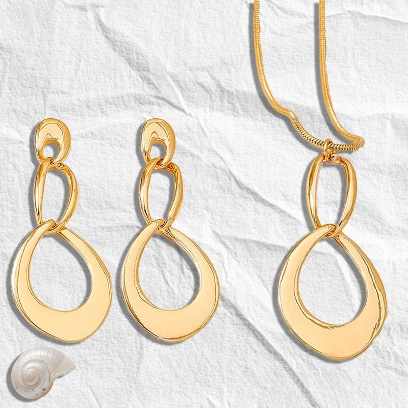 

Нишевый Дизайн Чувство Неправильный Полый Геометрический Стиль Индивидуальность Простой Универсальный Набор Серьги-гвоздики и Ожерелье золотисто-желтый