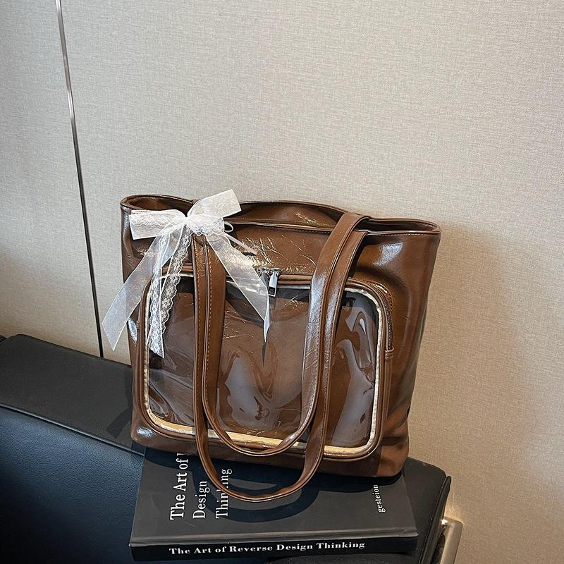 

Large capacity portable women s new casual commuter shoulder bag fashionable versatile tote bag коричневый