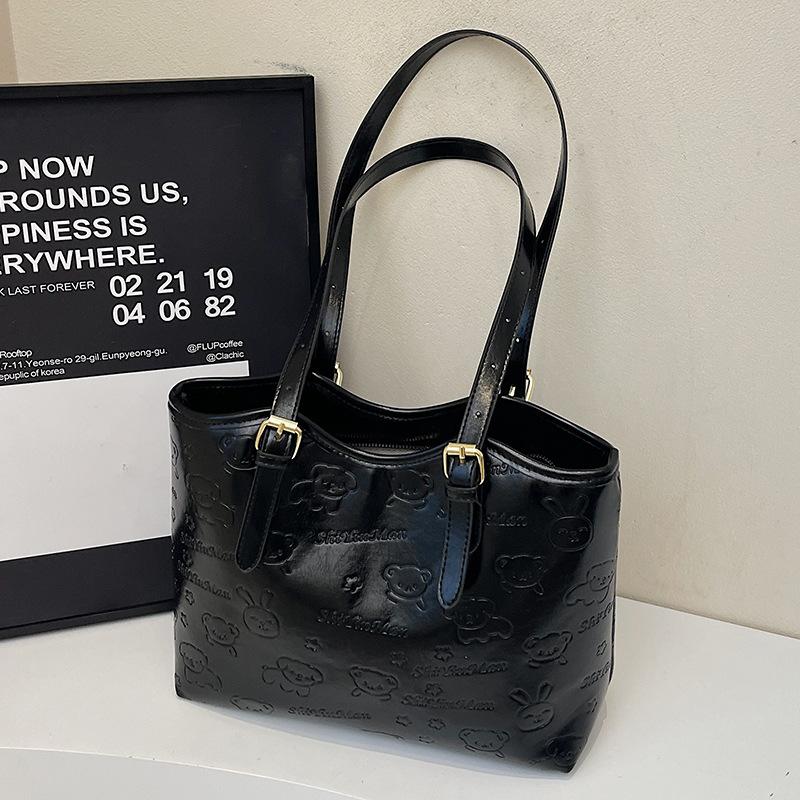 Spring and summer new casual Korean version cute embossed simple wind tote bag large capacity fashionable commuter shoulder women's bag