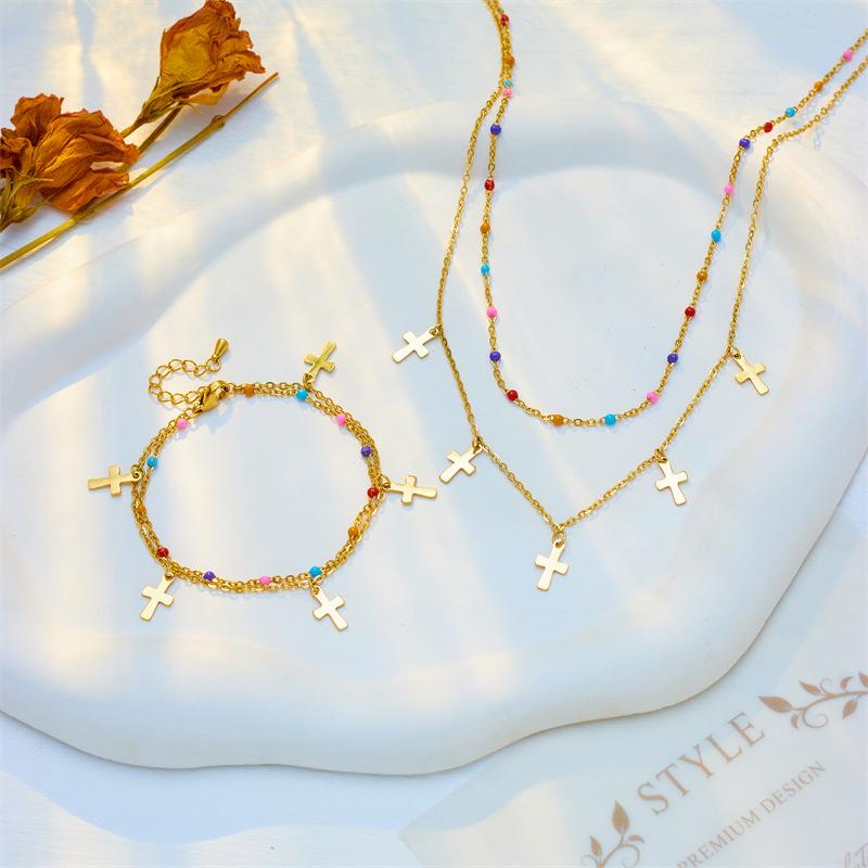 gold cross pendant layered necklace with colorful beads for women