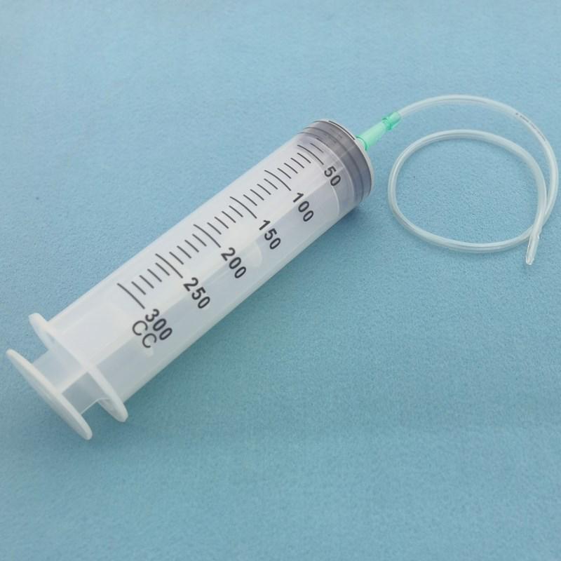 High-Capacity Flushing Syringe with Coarse Needle for Glue or Enema