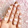 50Pcs Pink Series Bow Heart Resin Nail Charms 3D Luminous Double Butterfly Peach Heart Sweet Wind Nail Art Decorations Diy Nails