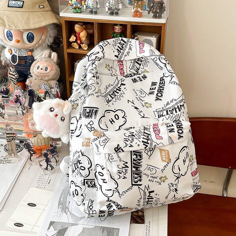 Schoolbag high-value printed graffiti schoolbag female junior high school student large-capacity backpack ins trendy brand high school student 
