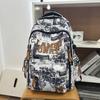 New Graffiti Niche School Bag for Junior High and High School Boys, Lightweight Spine Protection, Lightweight Large Capacity Design Laptop Backpack