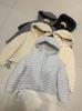 Autumn and winter new light and thin white duck down jacket women's short loose and versatile fashion hooded age-reducing jacket