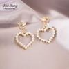 Elegant Pearl Heart and Triangle Ear Clips - No Piercing Needed, Trendy and Versatile Earrings for Women