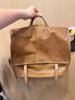 Small Niche Large Capacity Vegetable Tanned Leather Messenger Horizontal Backpack, New Versatile Commuting Casual Backpack for Work