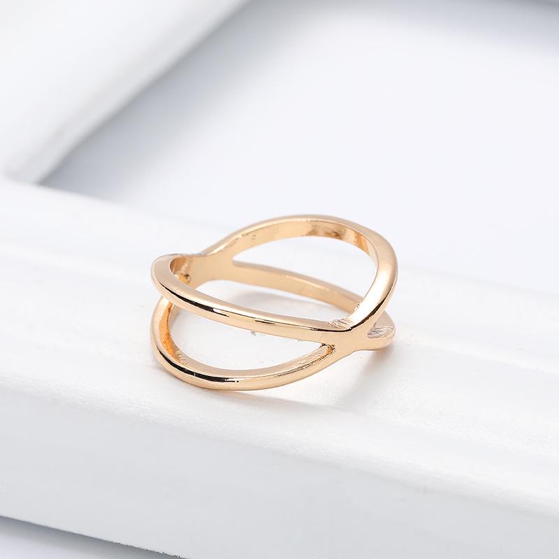 "Korean Gold-Plated Triple Ring Silk Scarf Buckle - Creative Fashion Cross Hollow Design"