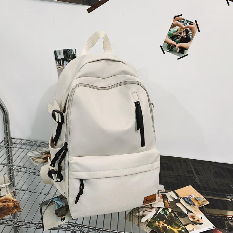 New backpack men's large-capacity high-end school bag female junior high school students high school students simple casual computer backpack