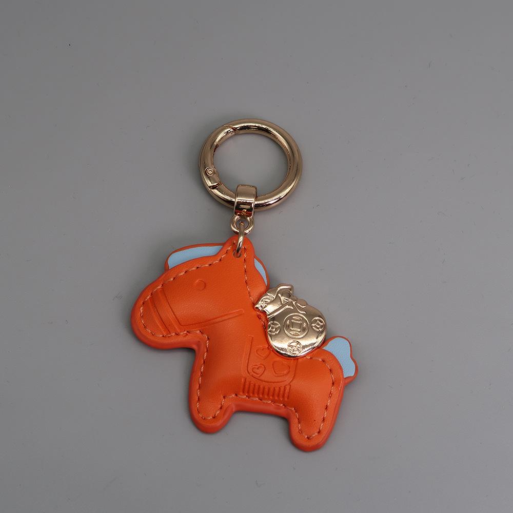 Instant Wealth Leather Keychain with Cartoon Pony Pendant for Couples – Trendy Bag and Car Accessory