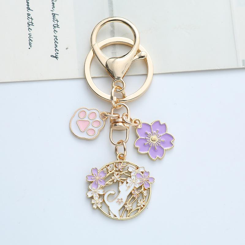 Cherry Blossom Cat Alloy Keychain Pendant - Creative Flower Cat Paw Accessories for Earphone Cases & Bags