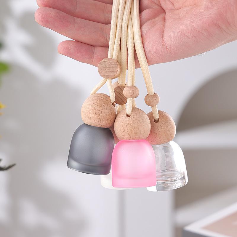 Frosted Glass Car Diffuser Bottle with Lanyard for Essential Oils - Refillable and Ideal for Home or Wardrobe Decor.