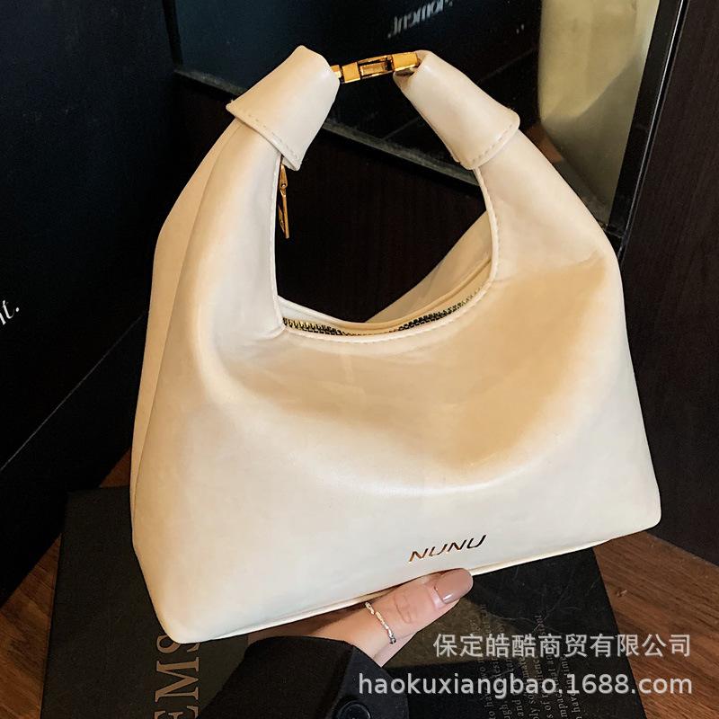 French niche bag women's summer 2025 new fashion shoulder messenger bag high-end foreign style portable dumpling bag
