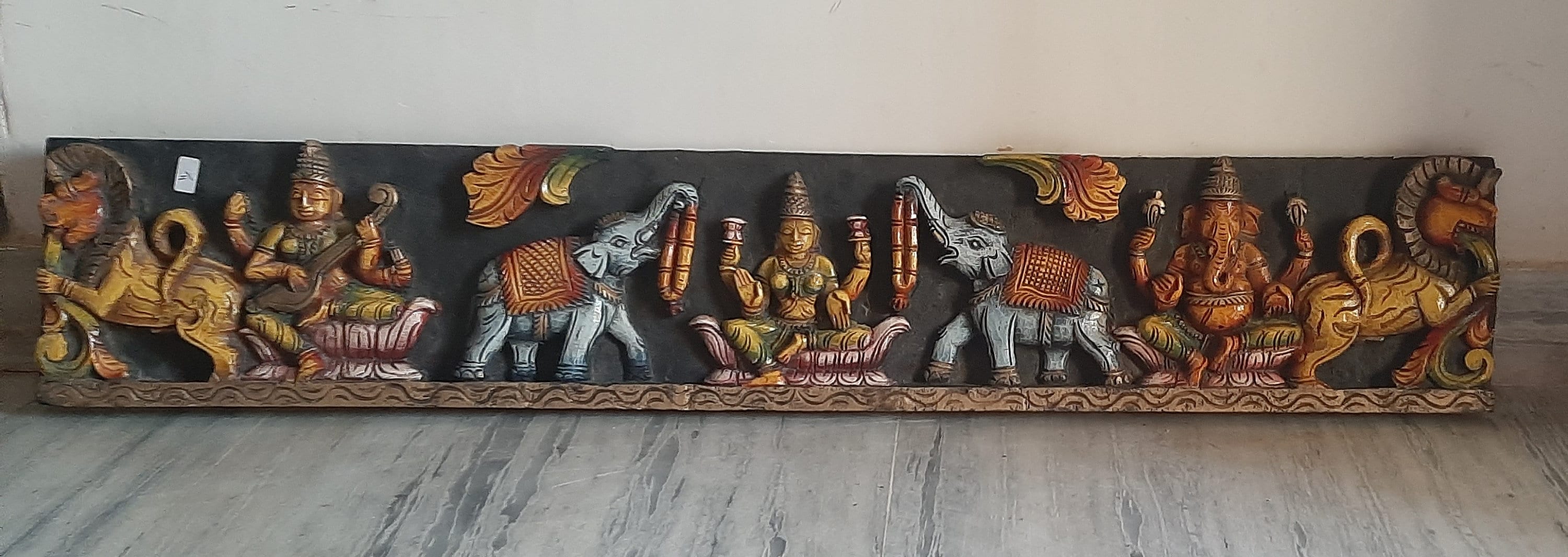 

Vintage Wooden Ganesha Laxmi Saraswati Wall Hanging: South Indian Carved Panel 16” X 8” X 24” (l x w x h) різнокольоровий