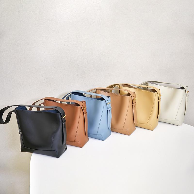 Cowhide women's bags, messenger bags, women's new leather women's bags, commuter bucket bags, fashionable and high-end shoulder bags.