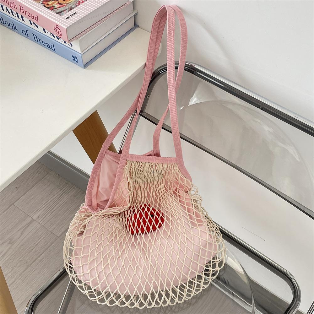 

Summer seaside play net pocket simple niche woven women s bag fashion shoulder bag shopping fishing net bag розовый