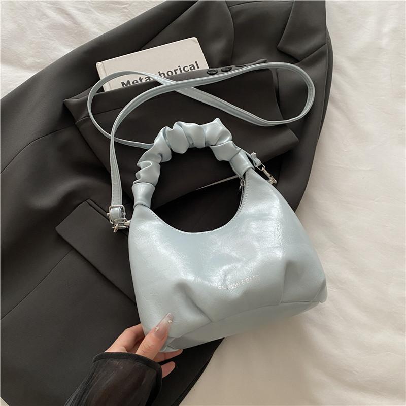 

Silver handbag bag women s 2025 new niche design cloud messenger bag spring and summer high-end sense work small bag синий