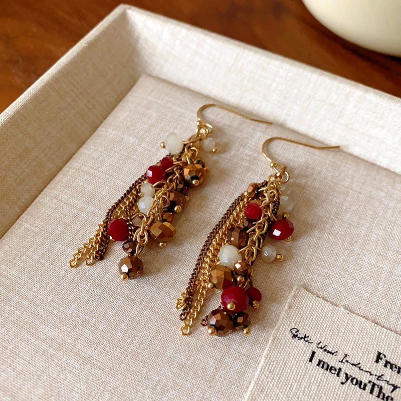 High-End Ethnic Teardrop Tassel Earrings with Cutout Design – Luxury Trend Jewelry