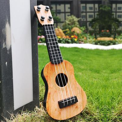 Mini 4 Saiten Klassische Ukulele Gitarre Spielzeug Simulation Kinder Kinder Anfänger Musik Aufklärung Kleine Gitarre für Unterhaltung