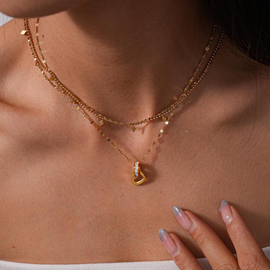 Diamond-Set Titanium Steel Heart Necklace with Unique Openwork Design - Elegant Choker for Women.