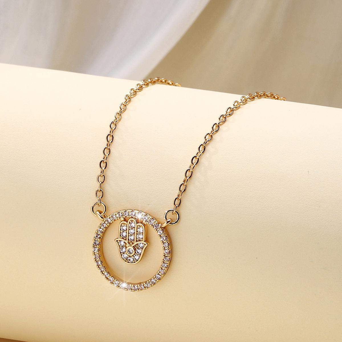 Fashionable Pendant Necklaces. Double-ring Palm-shaped Zirconium Gold-plated Pendant Necklaces. Circular palm-shaped pendant золотой