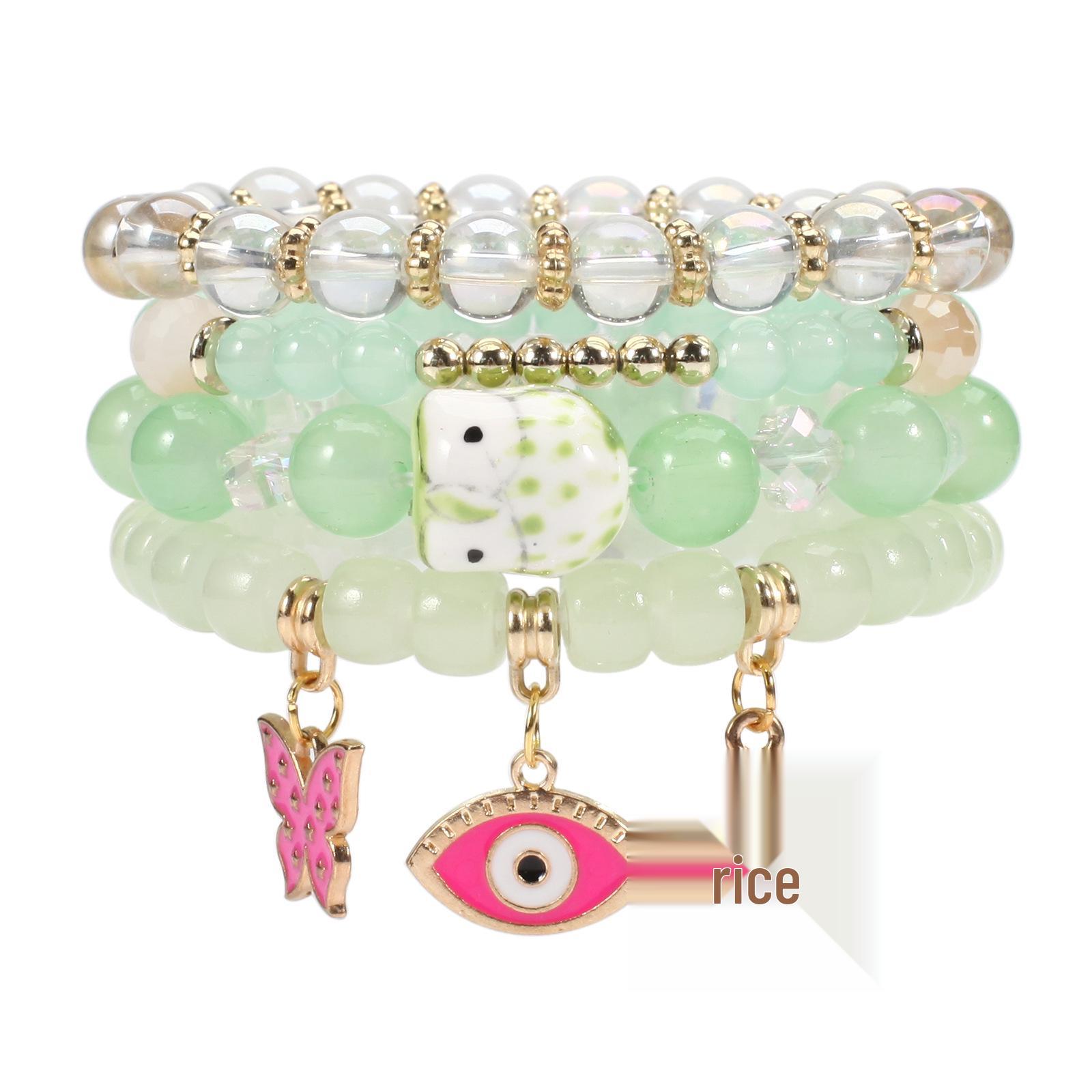 

Trendy Bohemian Beaded Bracelet Set with Eye, Butterfly, and Flower Pendants White
