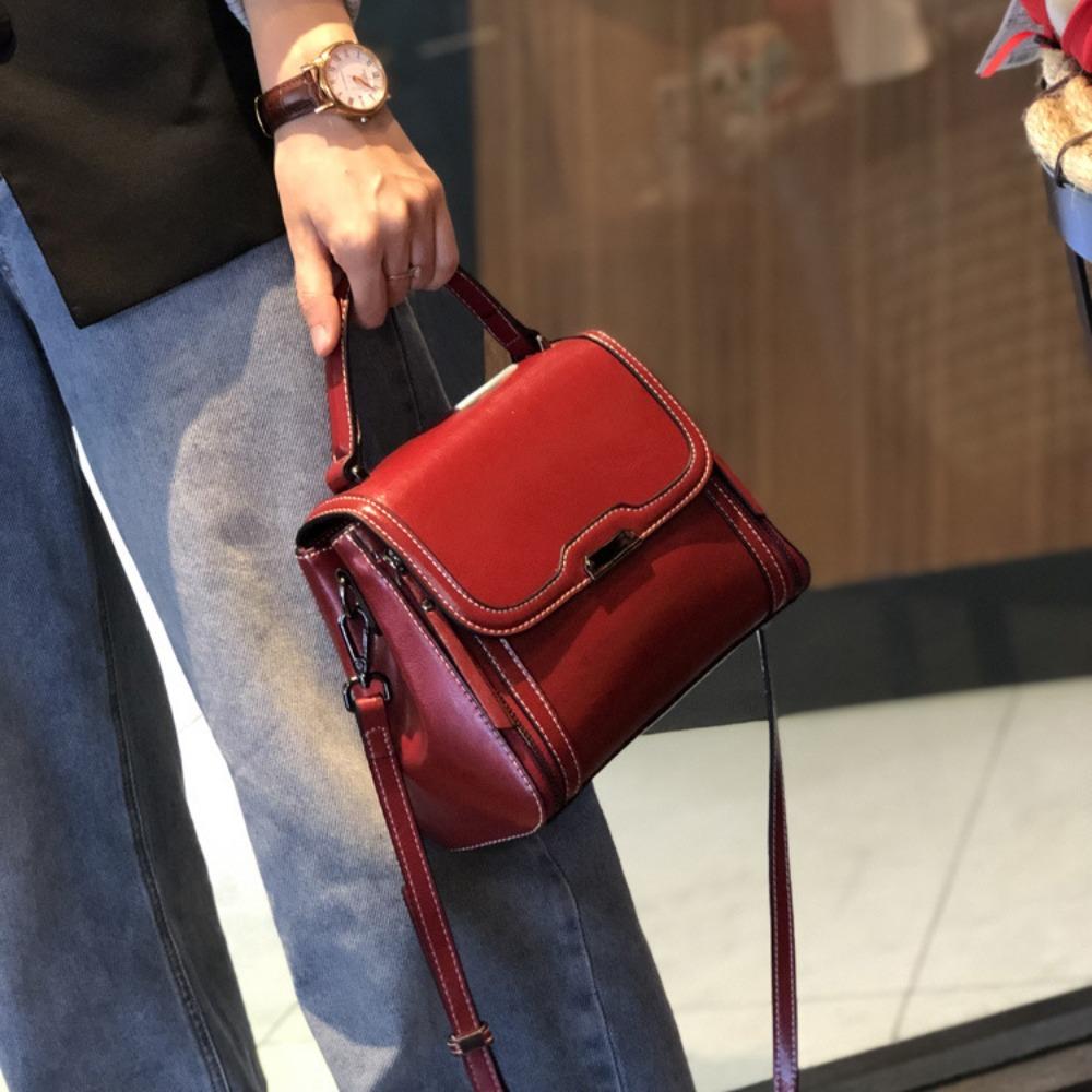 

Bags women s new autumn and winter fashion bucket bags, leather women s bags, messenger bags, high-end portable shoulder bags, trendy 23*11.5*18 бордовый