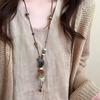 Handcrafted Bohemian Style Necklace with Mixed Material Beads Adjustable Length Pendant Necklace for Sweater Layering and Casual Wear