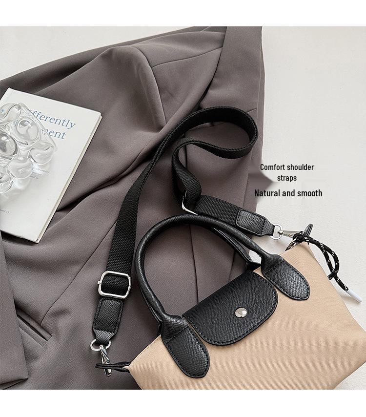 Minimalist Color-Block Oxford Cloth Handbag: Versatile, Fashionable Shoulder Bag with Unique Texture.