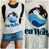 Vintage Biały Top na Ramiączkach Sea World z Lat 80. | Miękki T-shirt z Graficznym Nadrukiem | Rozmiar Mały