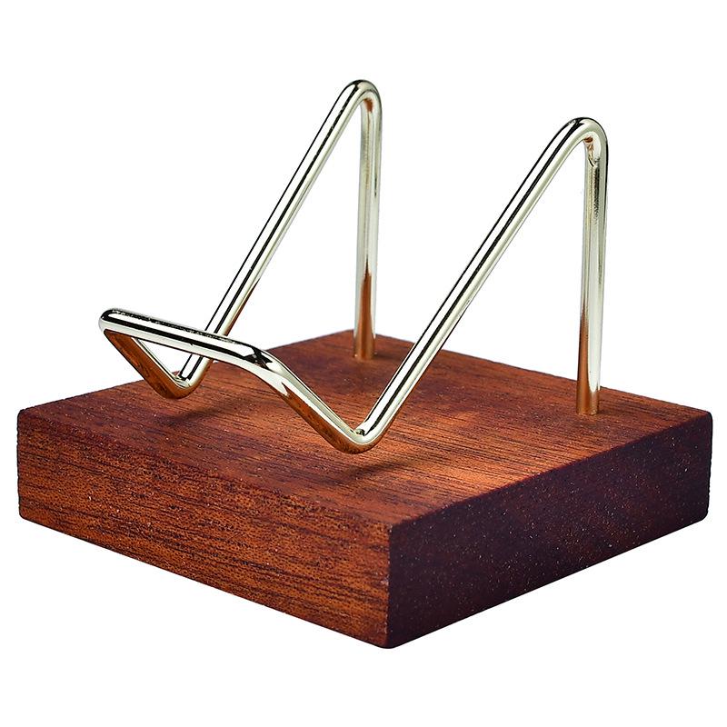 "Heart-Shaped Crystal Mineral Specimen On Iron Stand with Wooden Jewelry Display"