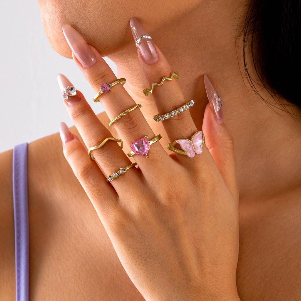 European and American new dripping butterfly imitation gemstone and diamond ring set Geometric twist ring seven-piece set
