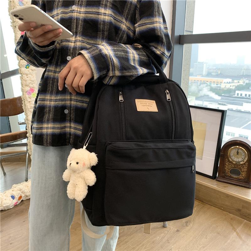 2025 New Portable Small Fresh Literary Canvas Labeled Women's Schoolbag Large Capacity Junior High School Student Backpack