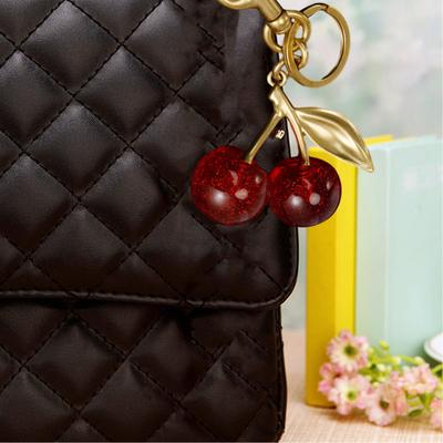 Borsa a tracolla con ciondolo a forma di ciliegia Borsa a tracolla per la scuola Ciondolo decorativo a forma di foglia di frutta Portachiavi in ​​acciaio inossidabile Portachiavi squisito
