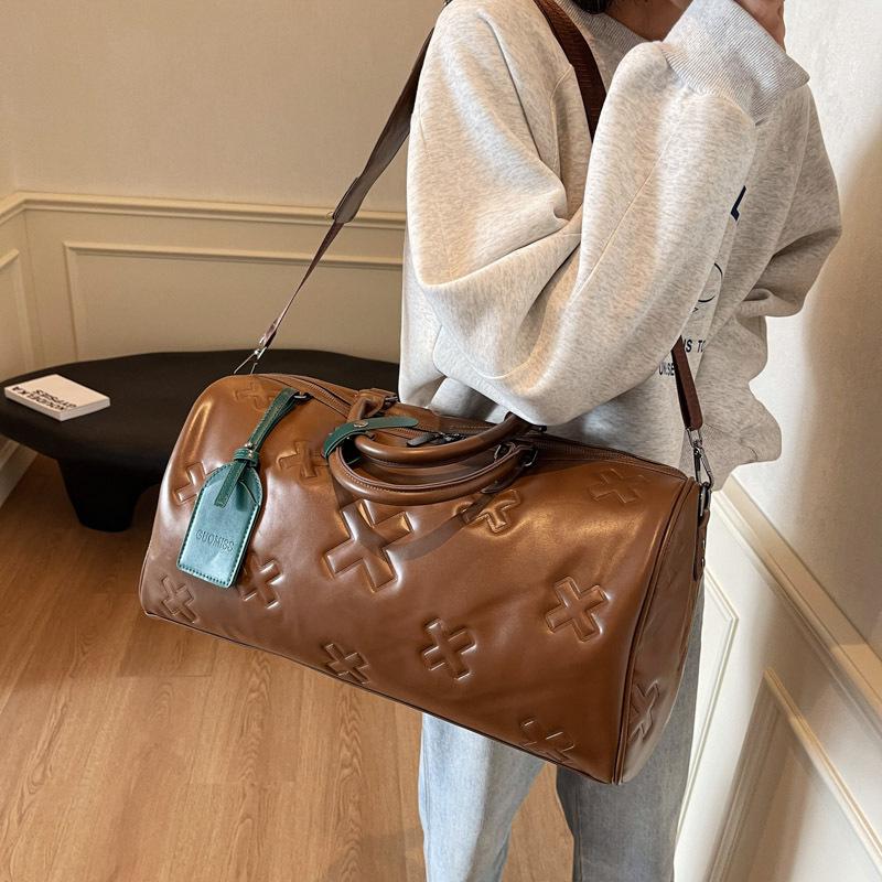 Fashionable PU Embossed Women's Handheld Travel Bag - Large Capacity Carry-on with Wet/Dry Separation for Business and Fitness.