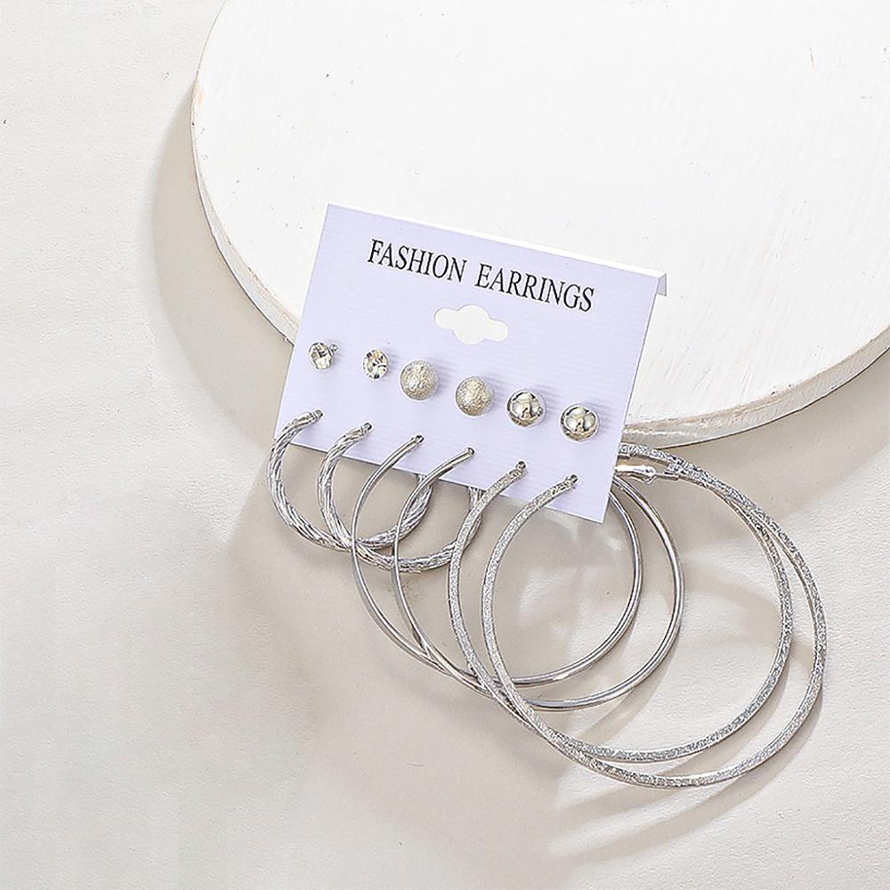 

12 штук Женские креативные модные универсальные темпераментные европейские и американские серьги из сплава Изысканный медный набор серег-звезд