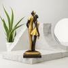 Stylish Golden Black Resin Romantic Couple Statue for Home Decor (Pack of 1, Black & Golden)