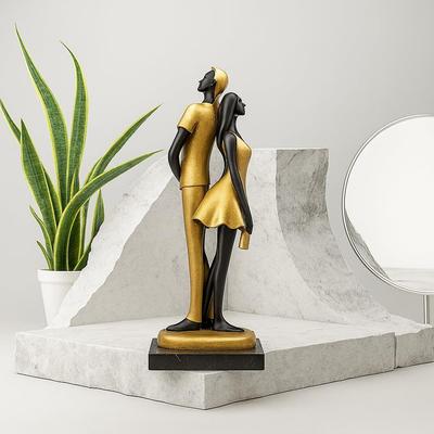 Stylish Golden Black Resin Romantic Couple Statue for Home Decor (Pack of 1, Black & Golden)