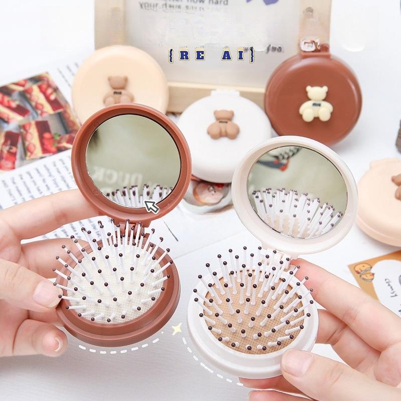 Süßer Cartoon faltbarer Airbag-Kamm tragbarer Mini-Kissen-Haarkamm mit Spiegel für Frauen integrierter Massagekamm leichtgewichtig