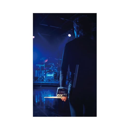 Roland TM-2 Trigger Module, a hybrid drum sound module ideal for live performance and practice. Supports SD card and battery operation, with two trigg