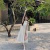 2026 new French lightweight three-dimensional flower neck sleeveless solid color pendulum long dress vacation dress women's tide