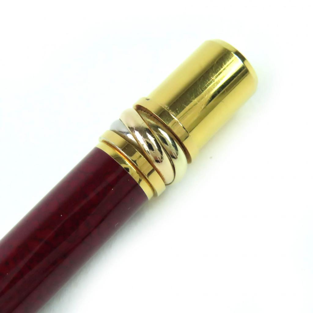 Very Good Cartier Ballpoint pen Trinity Marble Pattern Twist Type Bordeaux gold Used
