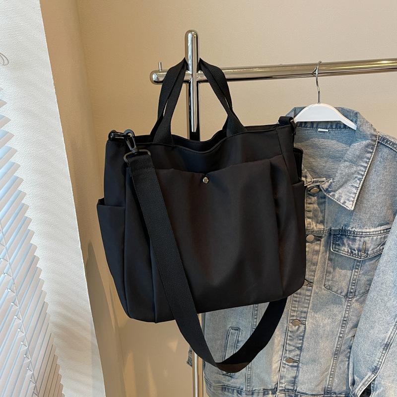 Simple commuter canvas bag Casual women's tote bag Portable multi-functional women's cloth bag Fashion cloth bag Large capacity