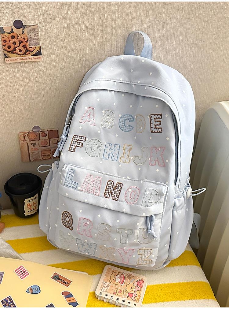 Schoolbag1011 summer new schoolbag female junior high school high school students large capacity niche ins backpack Korean version alphabet computer